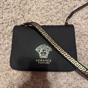 Versace Parfums Black Crossbody Bag with Gold Accent Strap